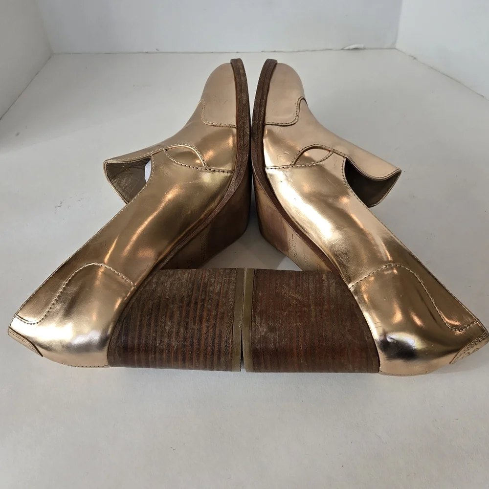 The office of Angela Scot Elegant Rose Gold Metallic Heels